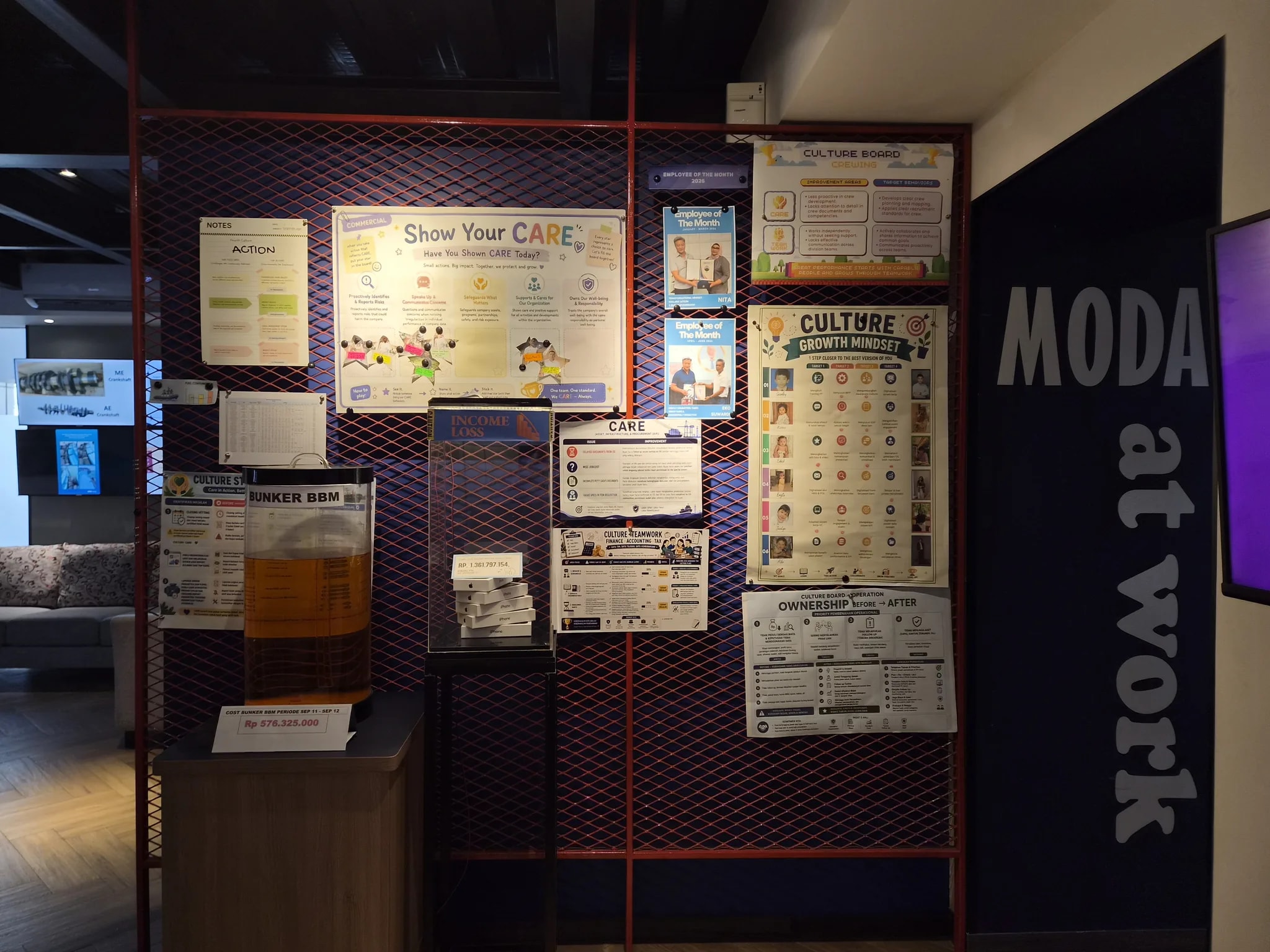 The MODA Holdings culture wall, displaying team values, recognition and performance boards.